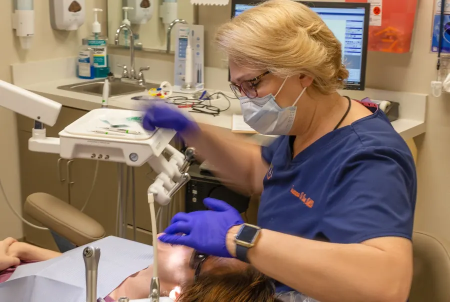 Dr. Core treating a patient in a Northshore Dental treatment room.